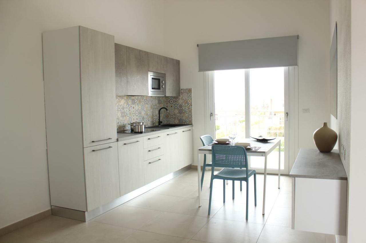 197 Pozzo San Nicola Aparthotel Stintino Bagian luar foto
