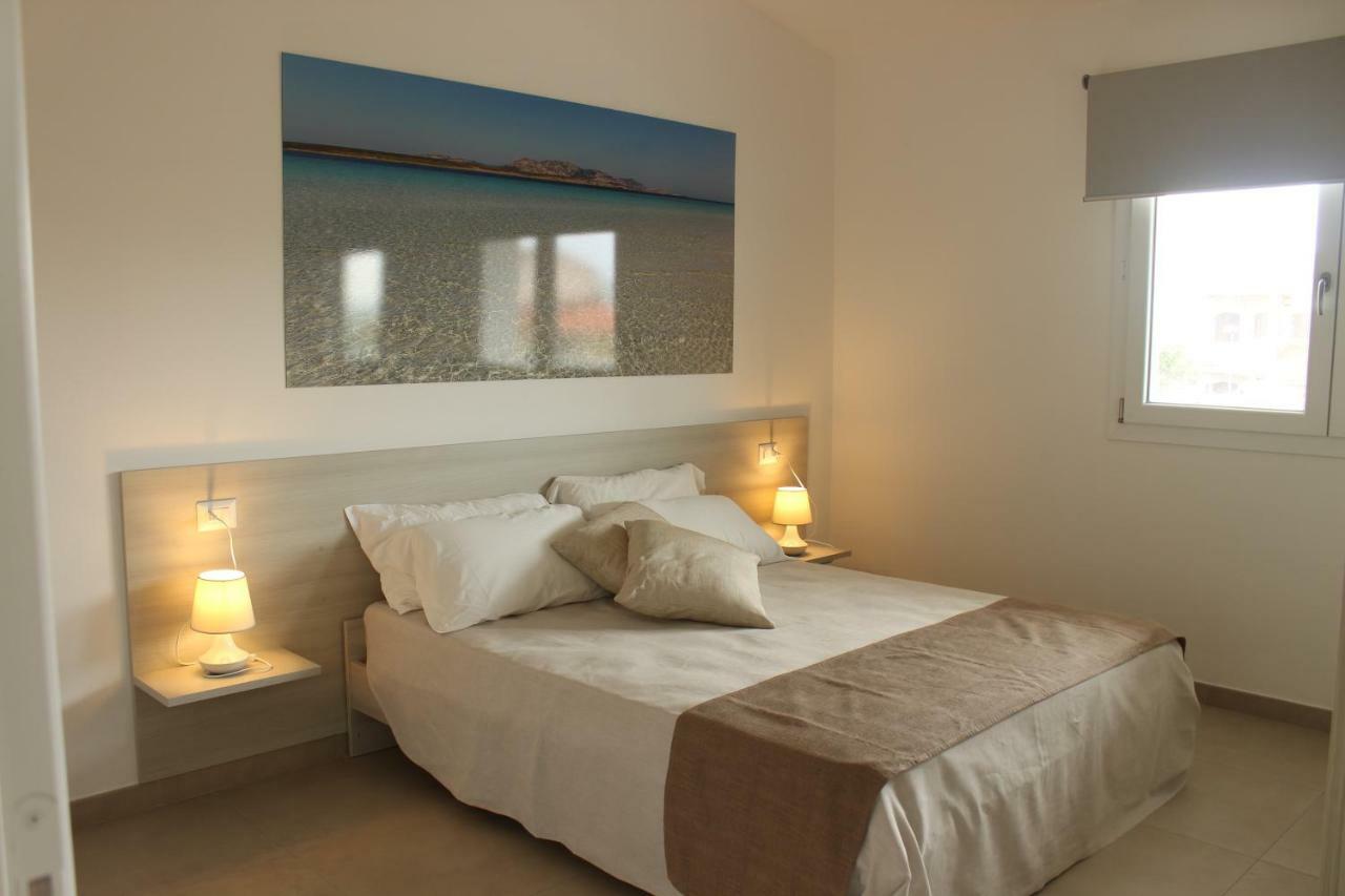 197 Pozzo San Nicola Aparthotel Stintino Bagian luar foto